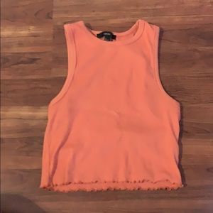 Peach colored halter top with lettuce trim